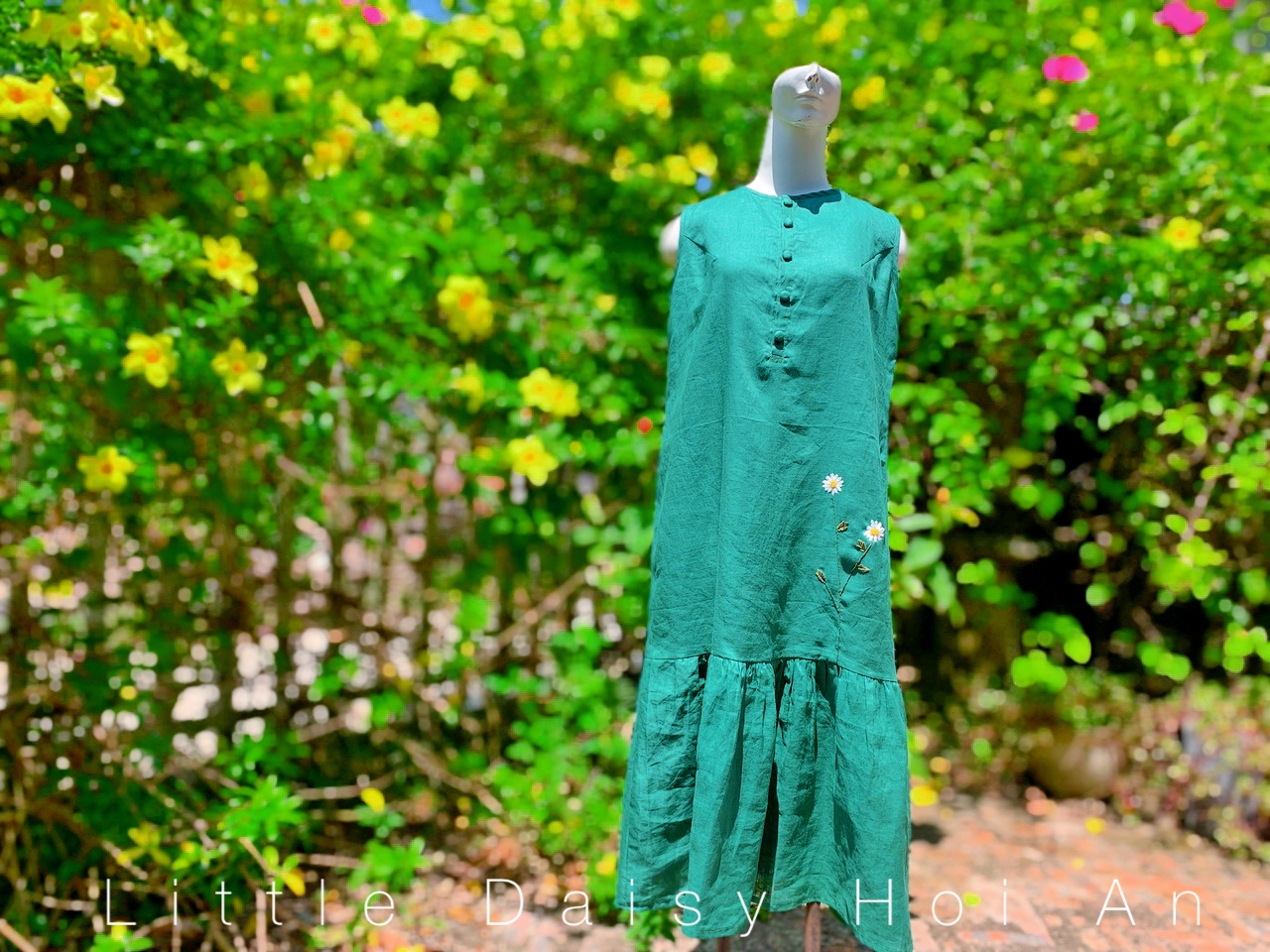 emerald linen dress with daisy hand embroidery